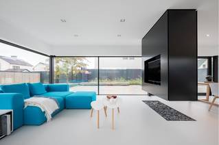 Liquidfloors Mellow pu gietvloer in woonkamer architectenwoning Oudenaarde