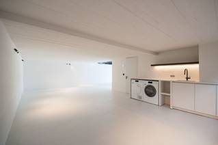 Liquidfloors Socrete minerale harsvloer gietvloer in wasruimte residentieel project knokke