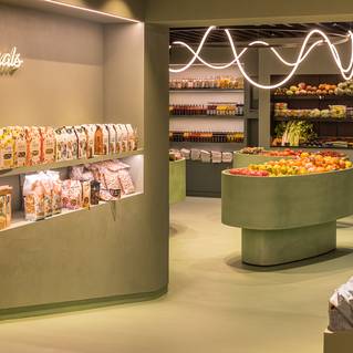 Interieur delicatessenwinkel Vandererfven met groene Socrete gietvloer
