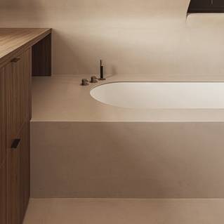 Badkamer met Socrete gietvloer die doorloopt op badmeubel