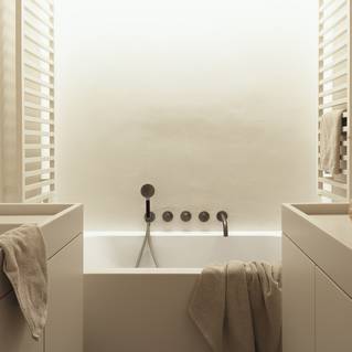 Socrete gietvloer in badkamer