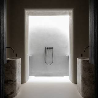 Minimalistische badkamer met inloopdouche grijze Socrete gietvloer