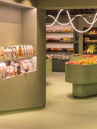 Interieur delicatessenwinkel Vandererfven met groene Socrete gietvloer