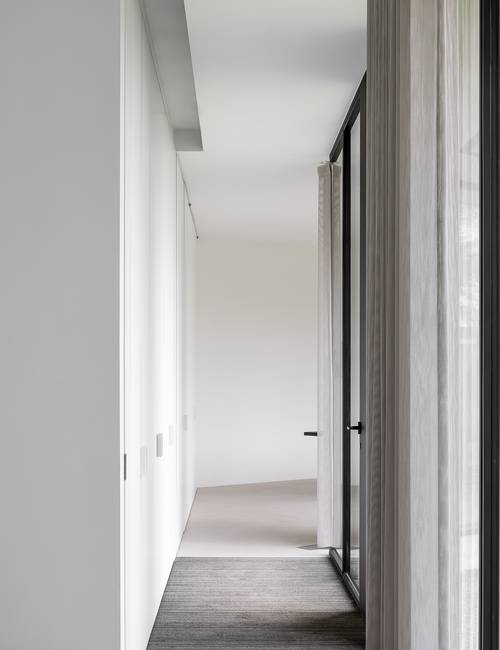 Socrete in corridor with recessed floor mat