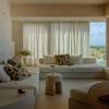 Living room in seaside flat with Socrete floor