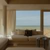 Living room coastal flat with Socrete cast floor