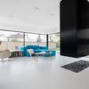 Liquidfloors Mellow pu gietvloer in living architectenwoning Oudenaarde