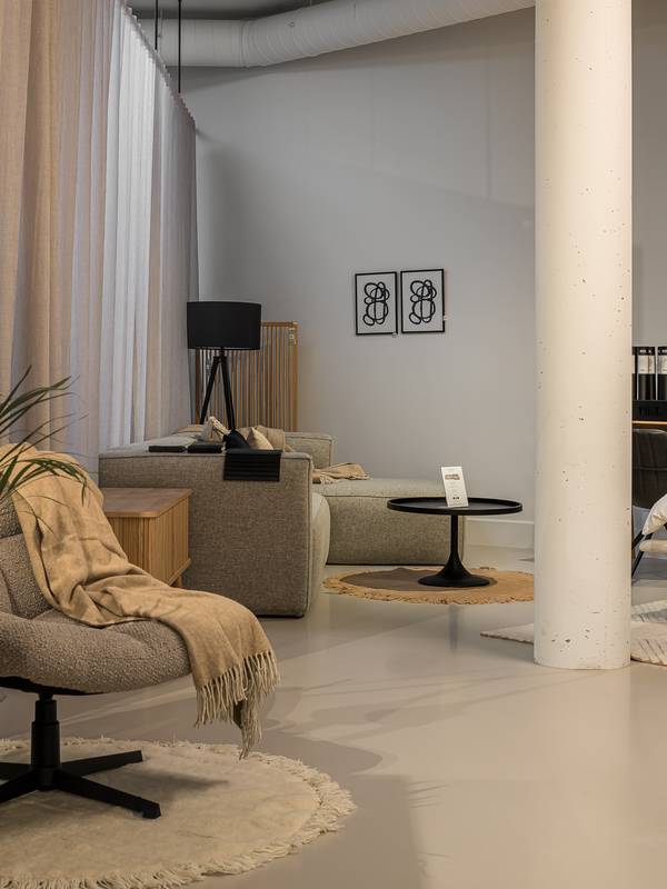 showroom with mellow floor and seating area